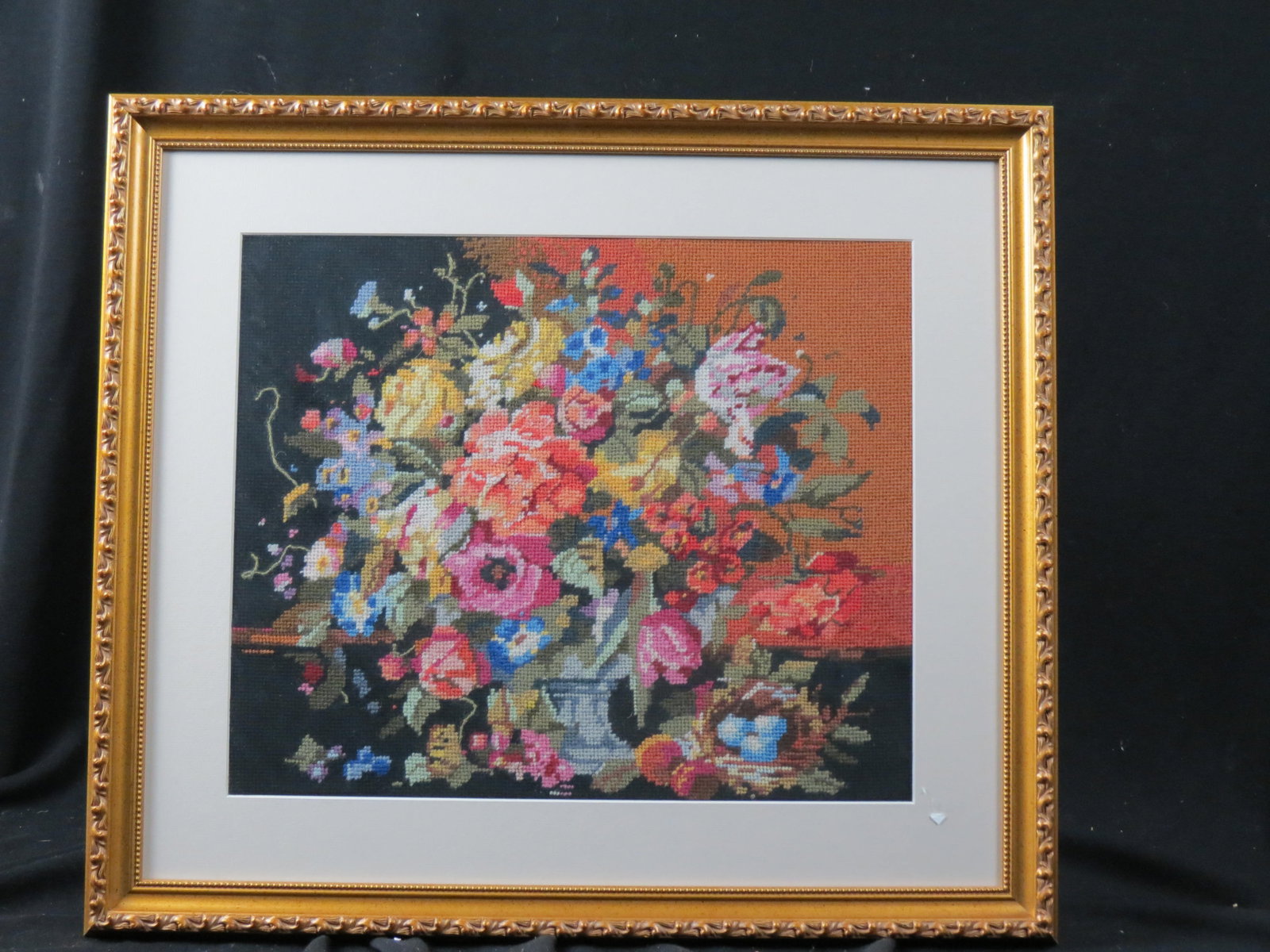 Needlepoint Floral Still Life, image area 14" X 16" plus mat and frame.: Needlepoint Floral Still Life, image area 14" X 16" plus mat and frame.