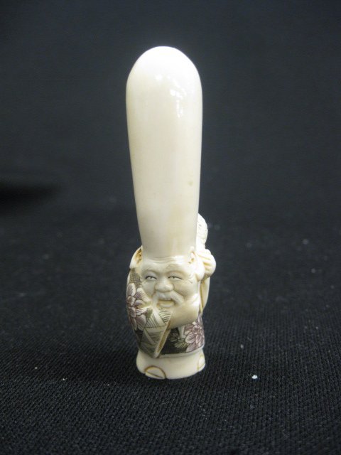 Carved Ivory Netsuke of an Immortal, large head,: 3 1/8", polychrome body, signed, excellent.