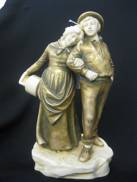 Bernhard Bloch Porcelain Figurine of Farm boy &: girl, gold & cream coloring, Amphora, circa 1Bernard Bloch was a pre-eminent entrepreneur in the field of ceramic industry and established the famous factory B. Bloch & Co. which, in 1920, was renamed
