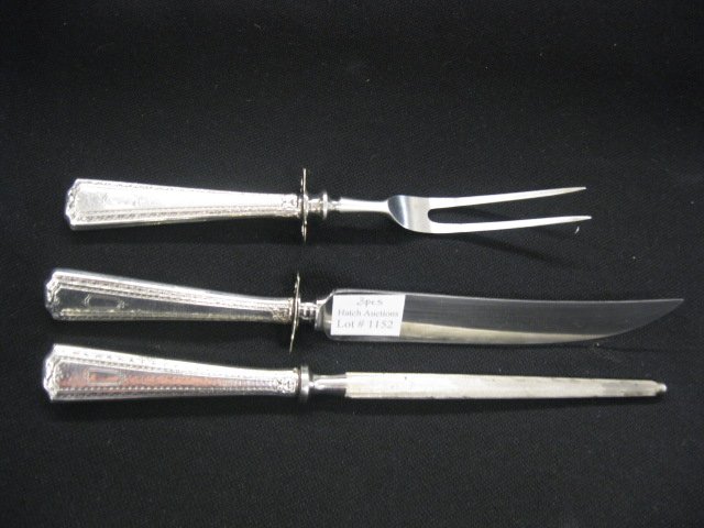 3 pc. Sterling Silver Carving Set,: knife, fork & sharpener, longest is 10 1/2", hand-hammered design from Arts & Crafts era.