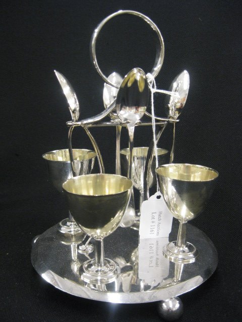 Harrods English Silverplate Egg Set,: center handle, 4 egg cups and 4 spoons, all feet, excellent.