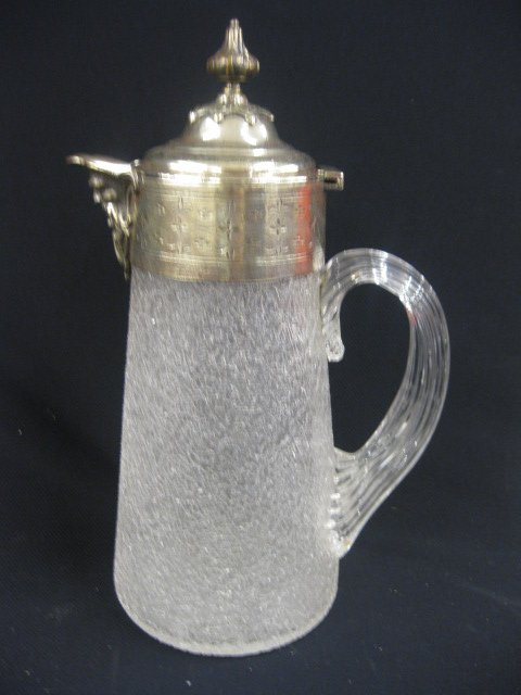 Victorian Covered Pitcher, fancy nickel brass top: fancy nickel brass top with figural god spout, crackle glass design body, 12" tall, circa 1880.