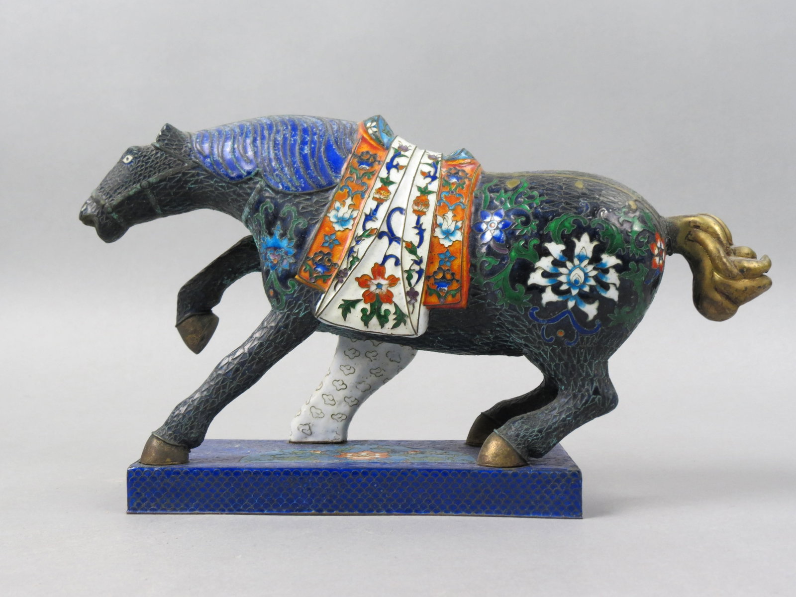 Chinese Cloisonne Figurine of a Horse,: saddled, fancy floral, platform base, 6 3/4" tall, 12" long, excellent.