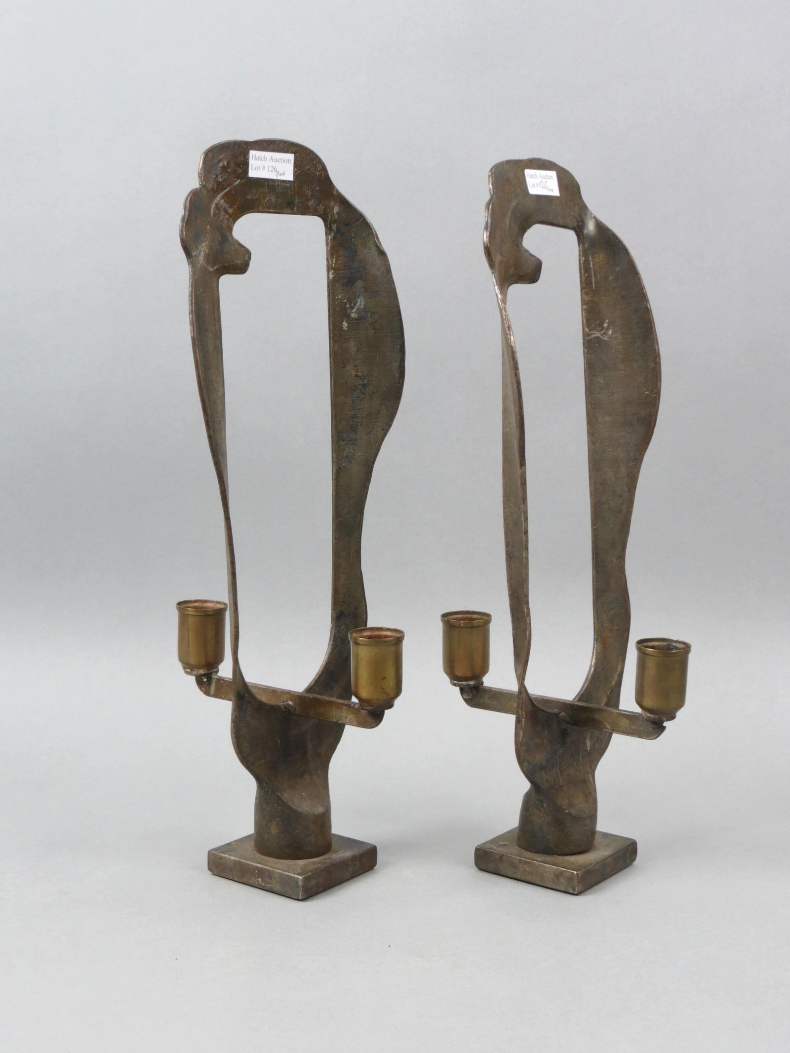 Pair of Paul Evans Style Brudalist Candlesticks,: steel with patina finish, double sconce, 15" tall, unsigned....Paul Evans (1931-1987) was an iconic American furniture designer, sculptor, and artist who is famous for his contributions to the America