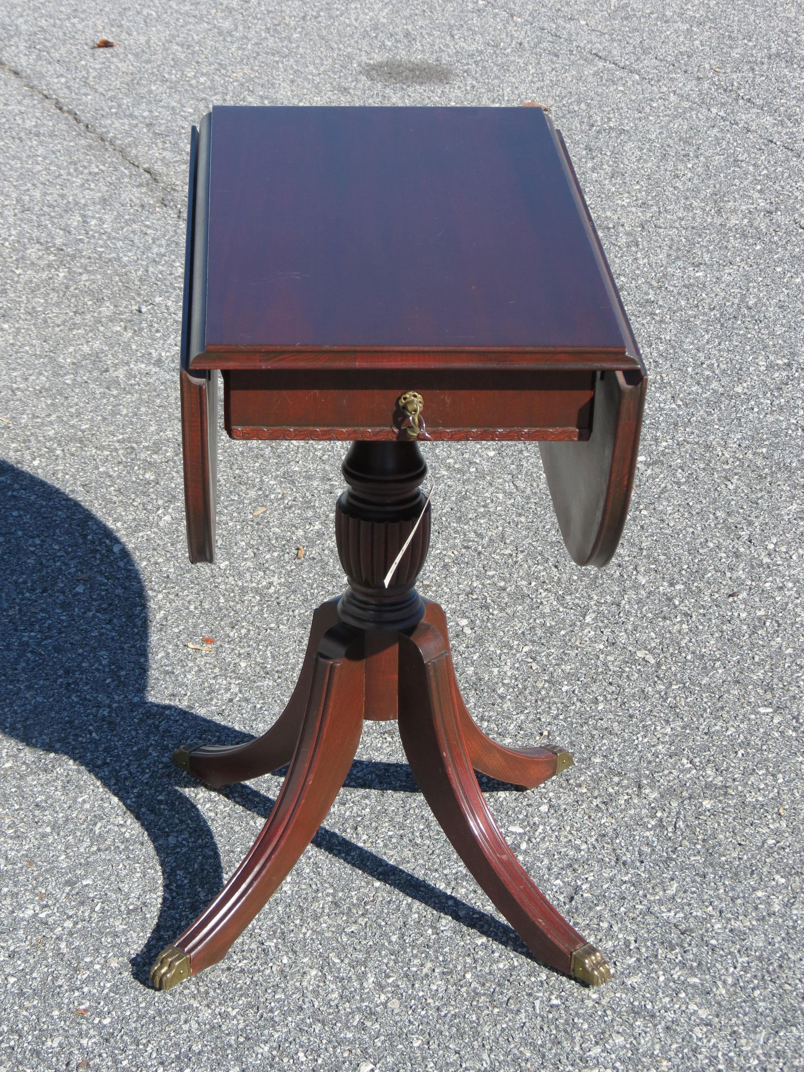 Duncan Phyfe Mahogany Side Table,: drop leaf, single drawer, 25" tall, 24" X 12" top (closed), 24" X 29" (open), circa 1940.