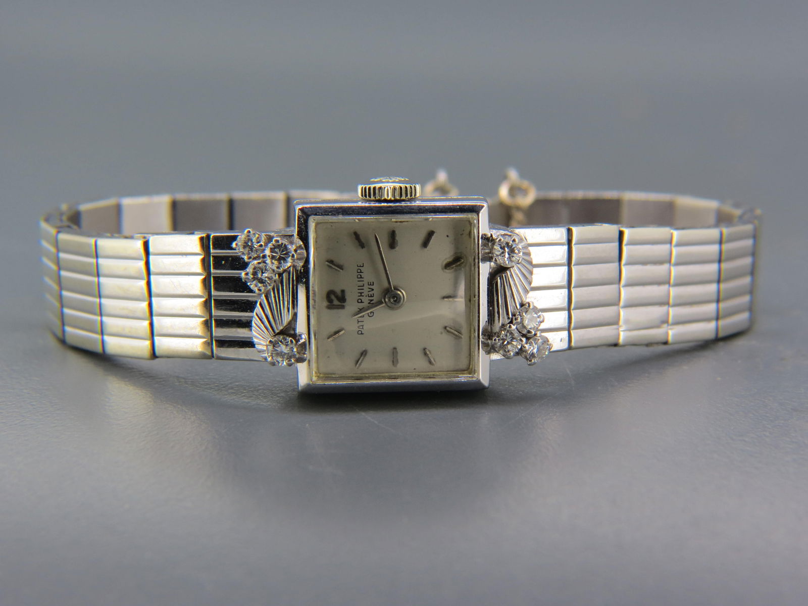 Patek Philippe 18K Gold Diamond Wristwatch,: ladies, heavy 18K white gold with 8 round diamonds totaling .40 carat, 35.2 grams, 6 1/4" wrist size, working.