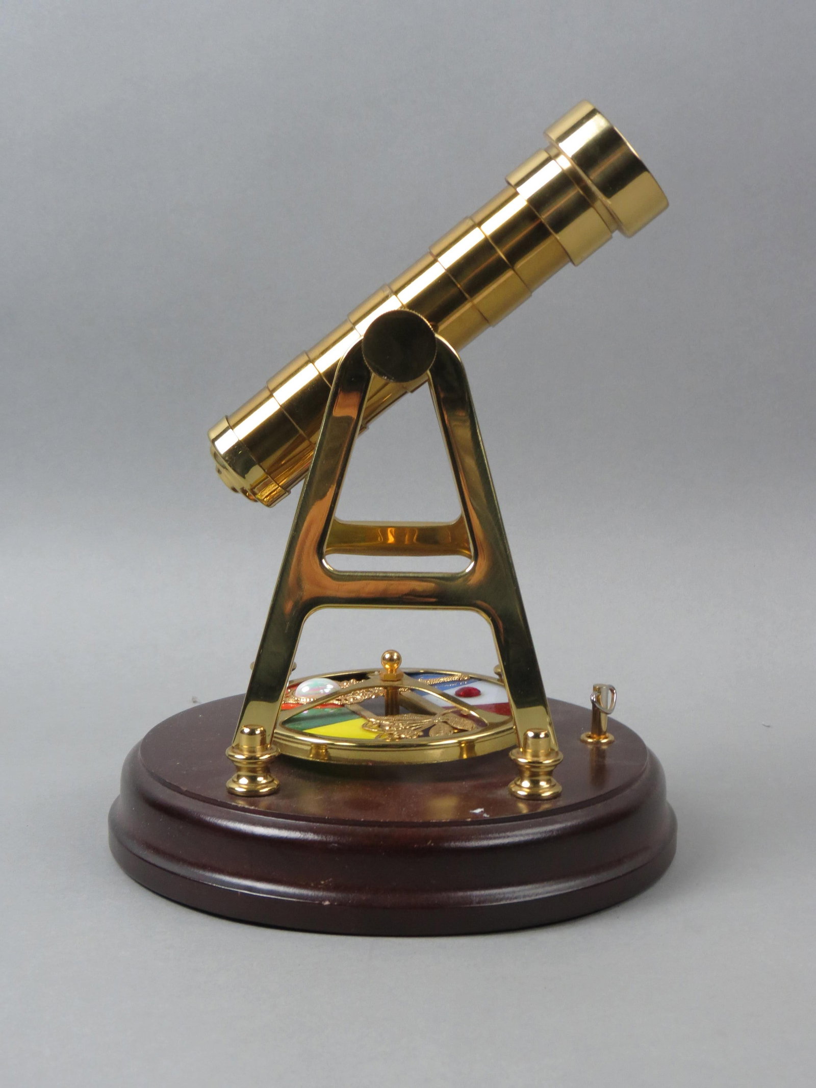 Kaleidoscope with Music Box,: revolving jeweled art glass in base, 8 1/2", working.