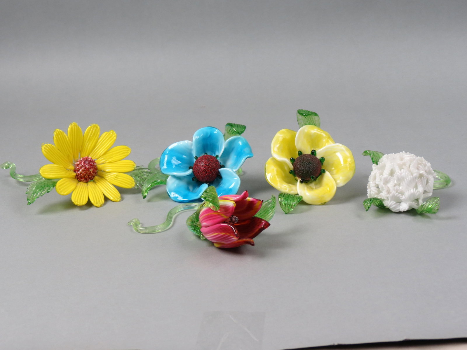 5 Italian Art Glass Flowers,: various designs and colors, mostly 3 1/2" tall and 7" long, excellent.