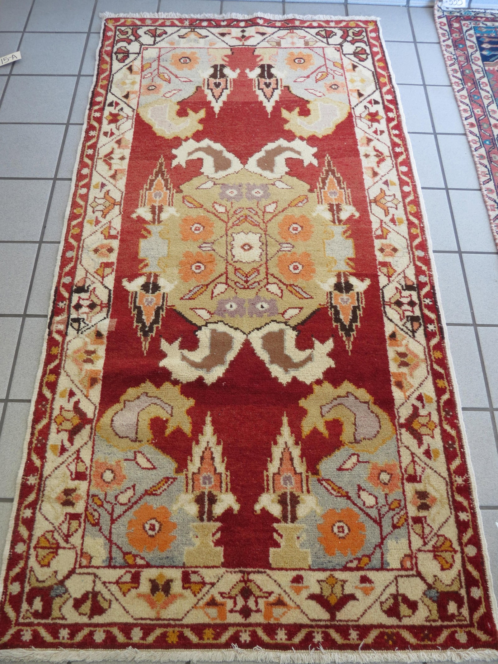 Oushak Turkish Handmade Rug,: stylized florals, red field, 3' X 6'.