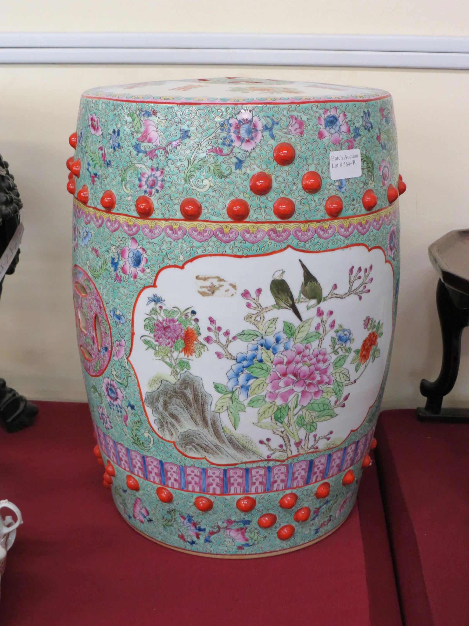 Chinese Famille Porcelain Garden Seat,: birds, flowers and fauna, studded red "ball" decor, 19" tall, 14" diameter, excellent.