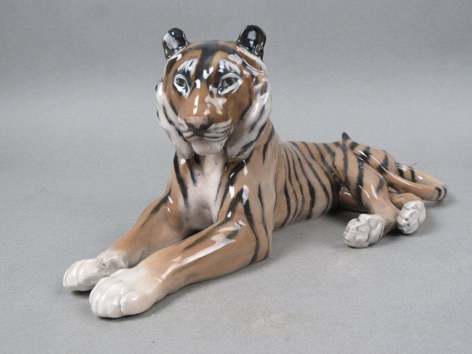 Royal Copenhagen Porcelain "Recumbent Tiger": Figurine, #714, 5 1/4" tall, 12 1/4" long, excellent.