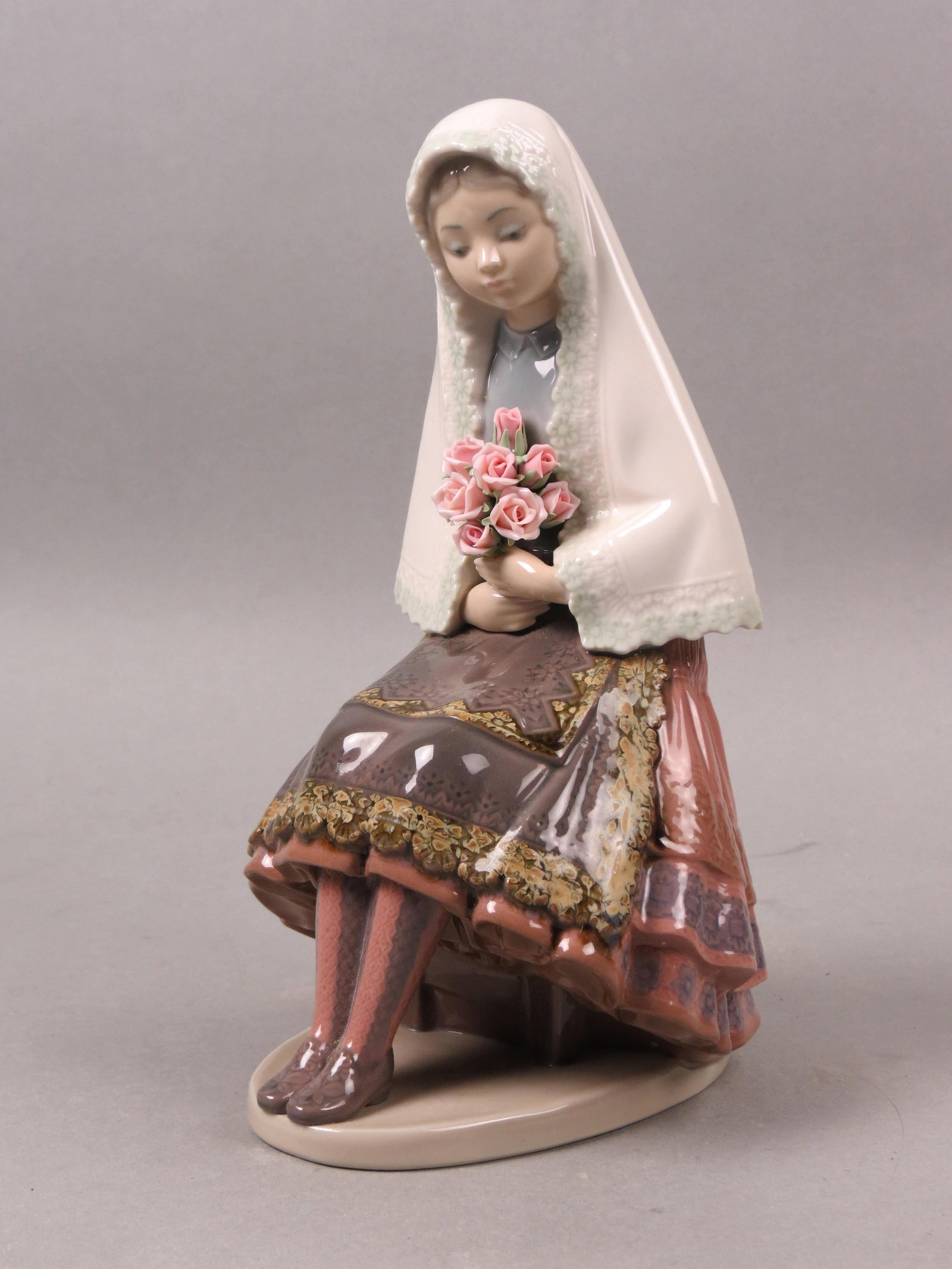 Lladro Figurine "Marcelina" #5127,: 10", issued in 1982 at $225.00, excellent, with box...... Due to fragile nature of the Lladro figurines (fingers and flowers mostly) if you want them shipped by in-house shipping we will no longer be 