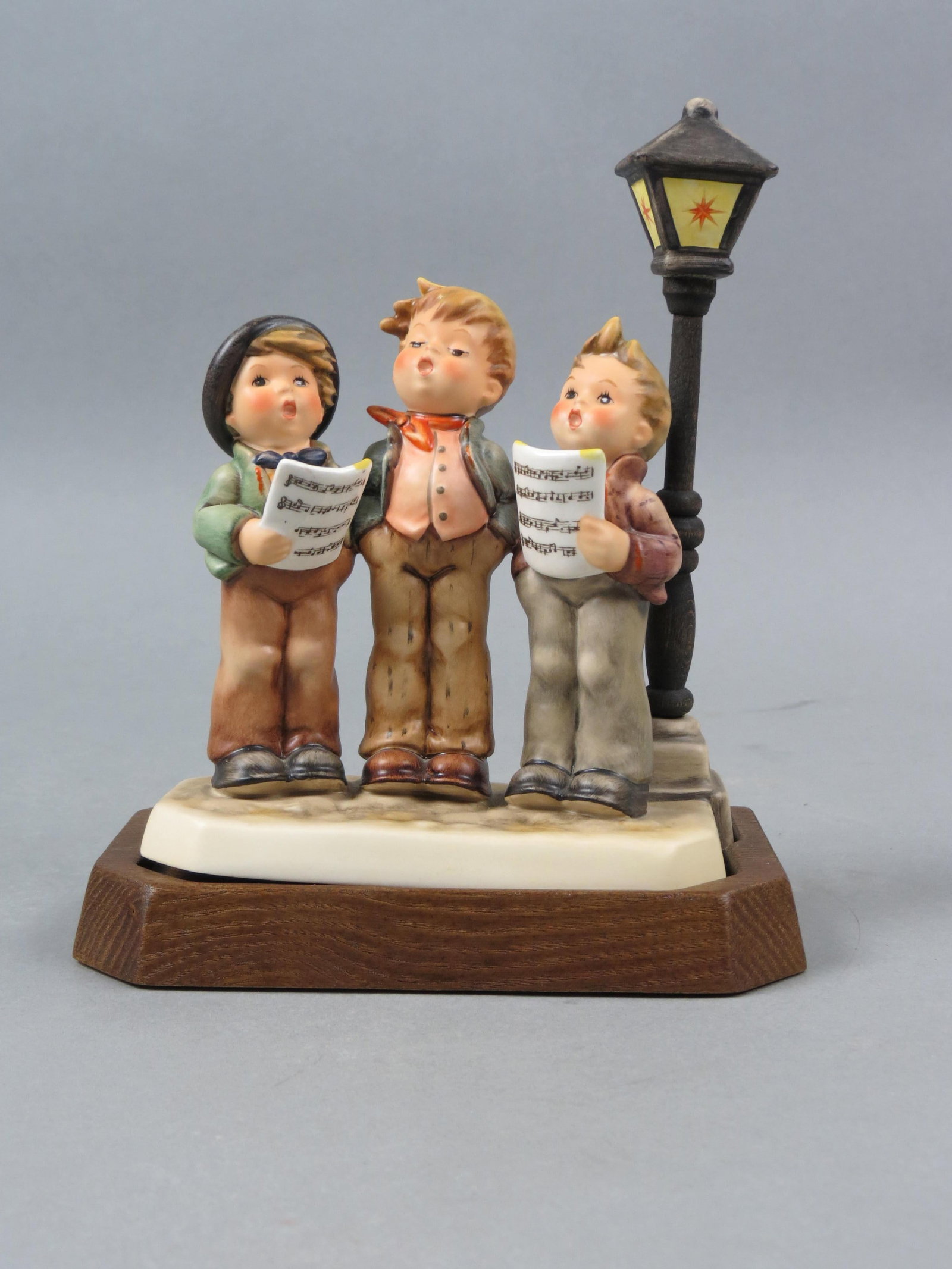 Hummel Figurine "A Tunefull Trio", #757,: 1996 First Edition, trio collection, 6 1/2" plus base, excellent, with box.