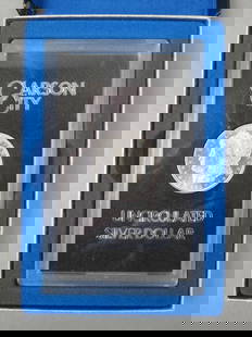 1882-CC U.S. Morgan Silver Dollar, Carson City,: uncirculated, in government holder (GSA), semi-proof-like, with certificate.