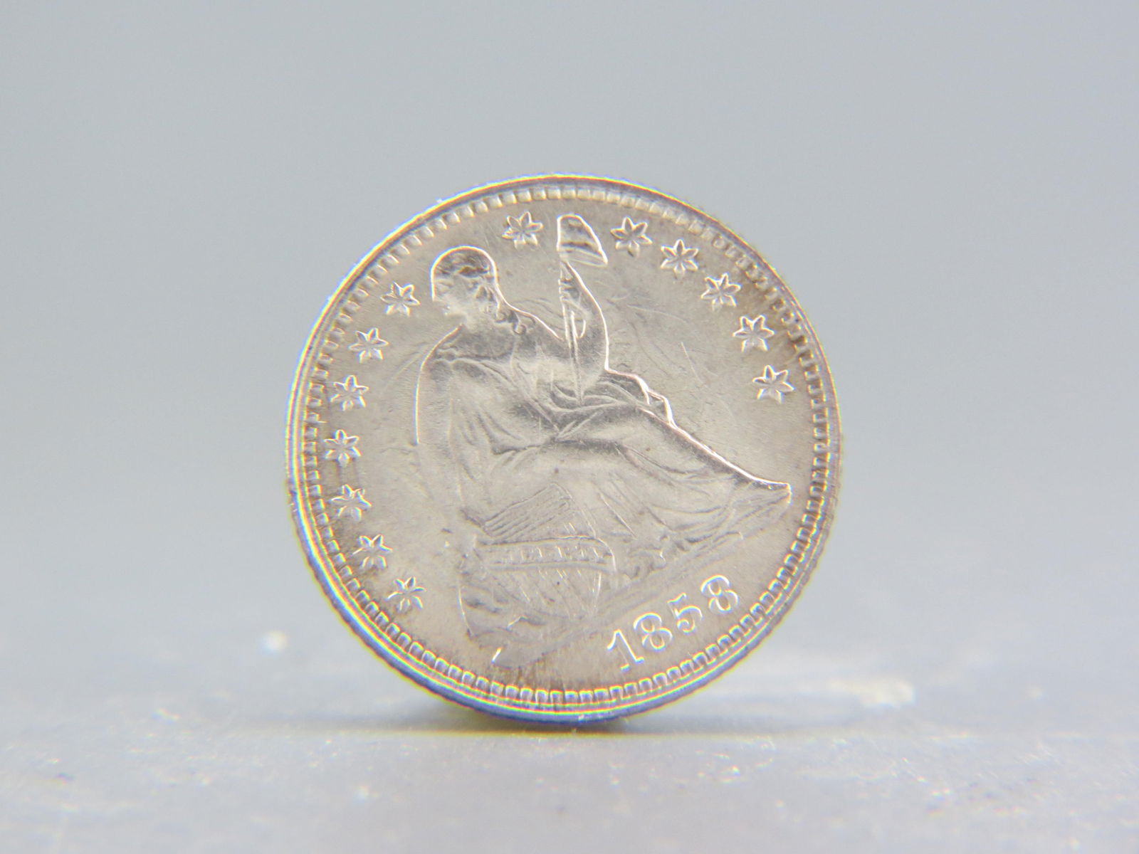 1858 U.S. Seated Liberty Half Dime, unc., (1 of 2)