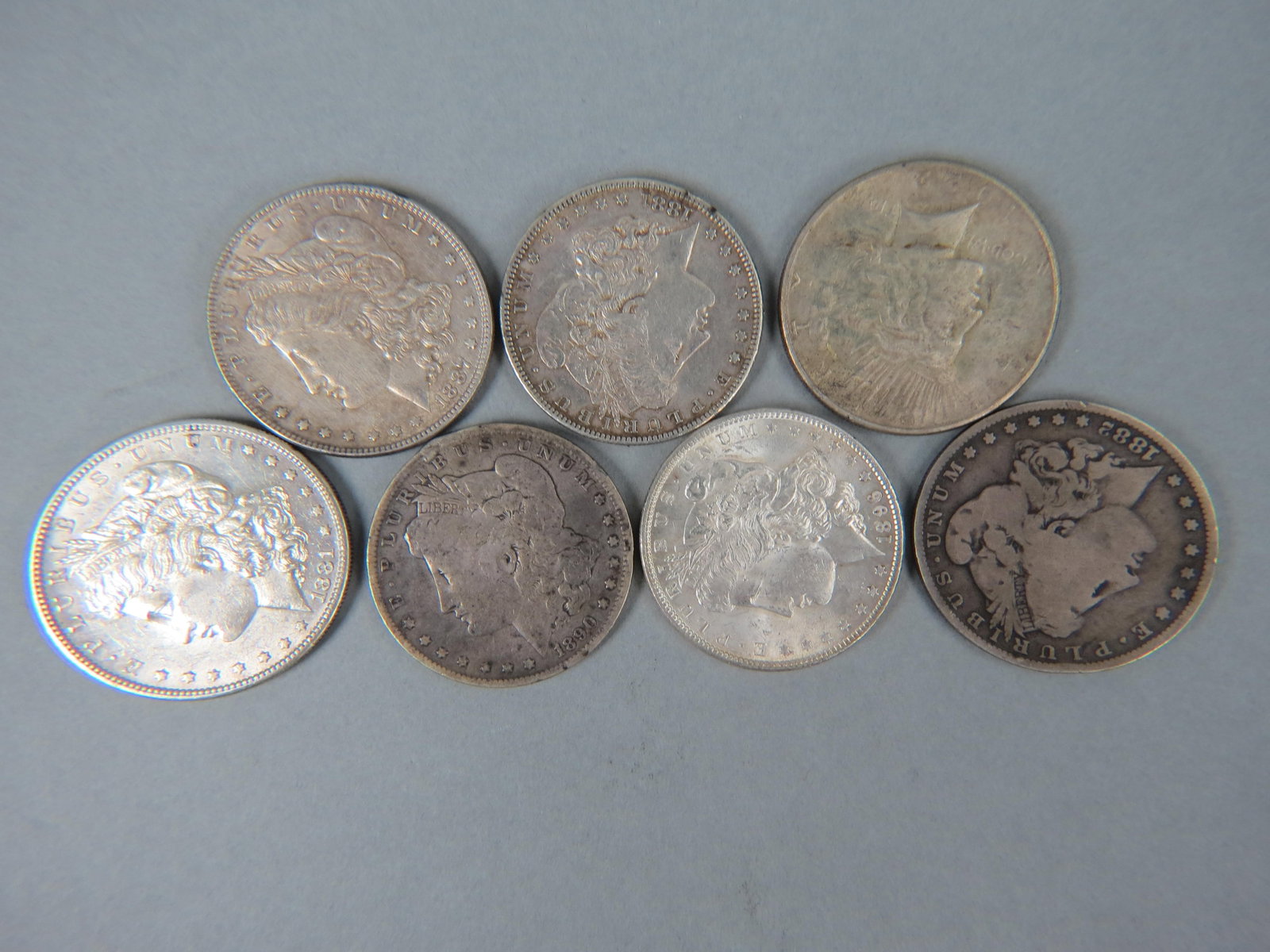 7 Morgan & Peace Silver Dollars, (1 of 3)
