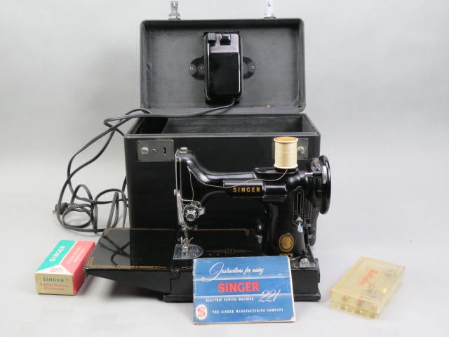 Singer Featherweight Sewing Machine,: #221, in black case, with attachments, 1956, serial number AM373794, working.