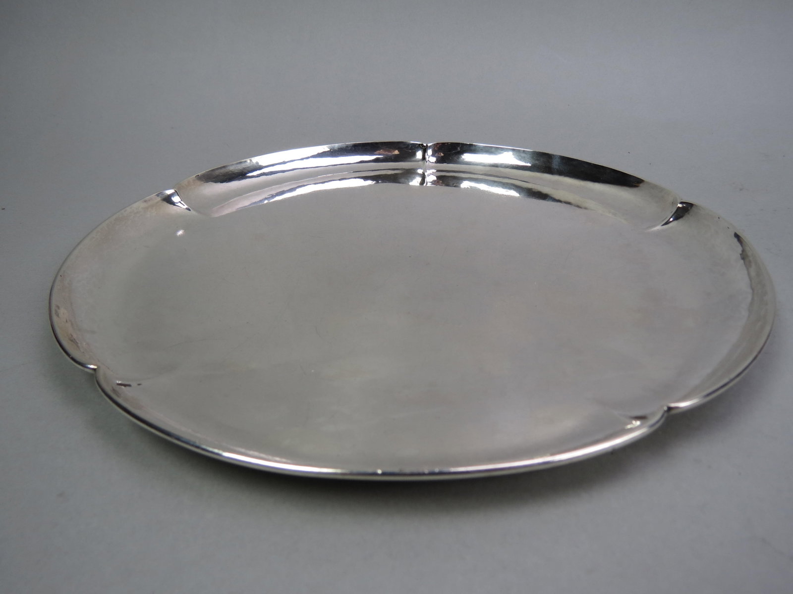 Kalo Sterling Silver Arts & Crafts Tray,: lobed design, marked on back "Designed and hand wrought for Esther Van Dervoort", 10 3/4" diameter, #F656L, 493 grams.