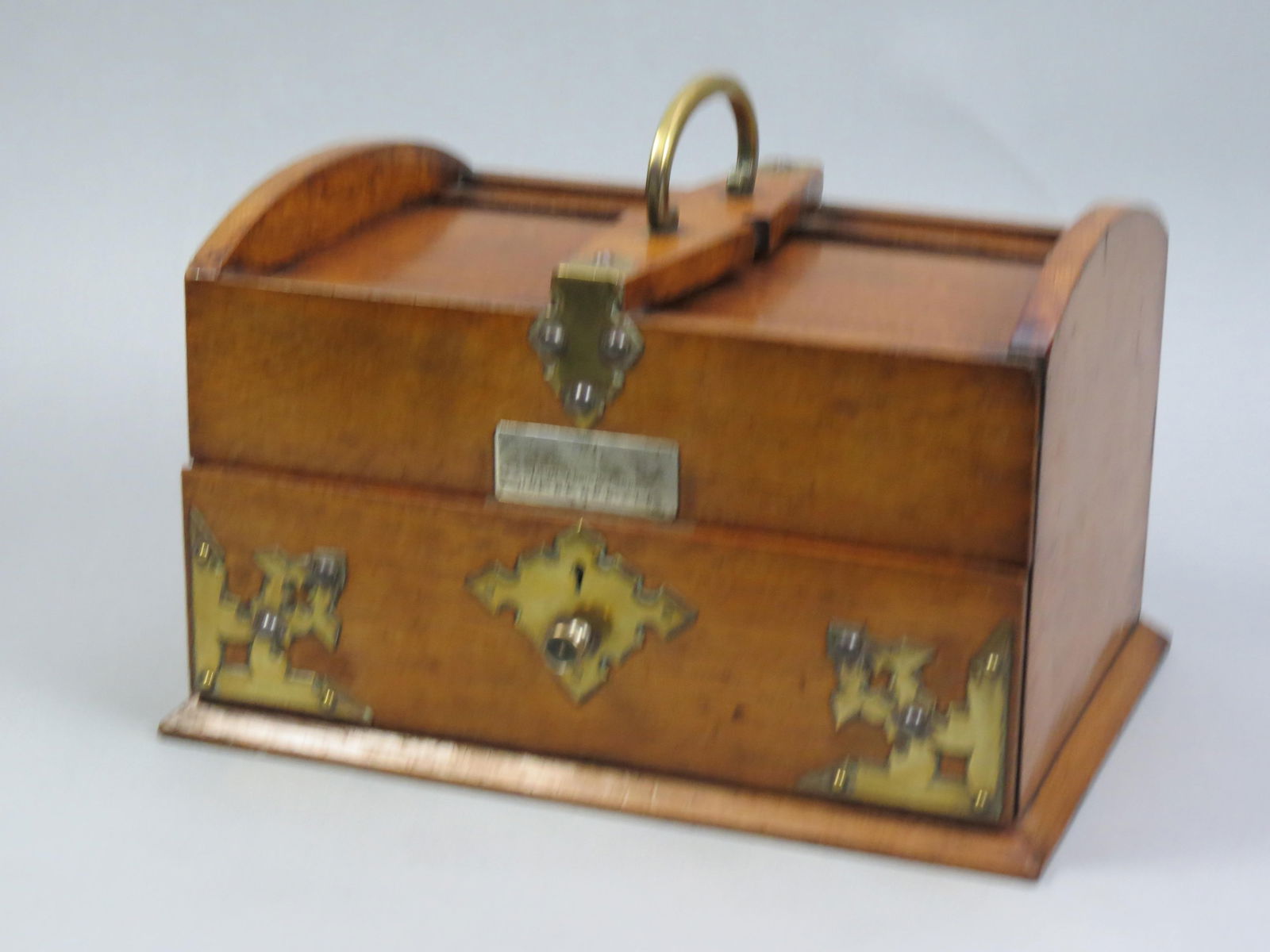 1892 Wooden Travel Desk with Brass Trim,: roll top opens when lower drawer slides open, lift out tray, center handle, silver plaque depicting as a 25th wedding anniversary gift in 1892.