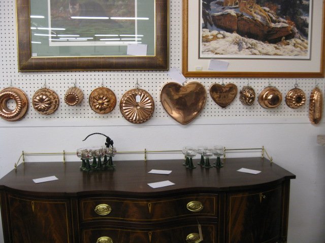 Collection of 11 Copper Molds,: various sizes and shapes, some Victorian, all polished & lacquered.