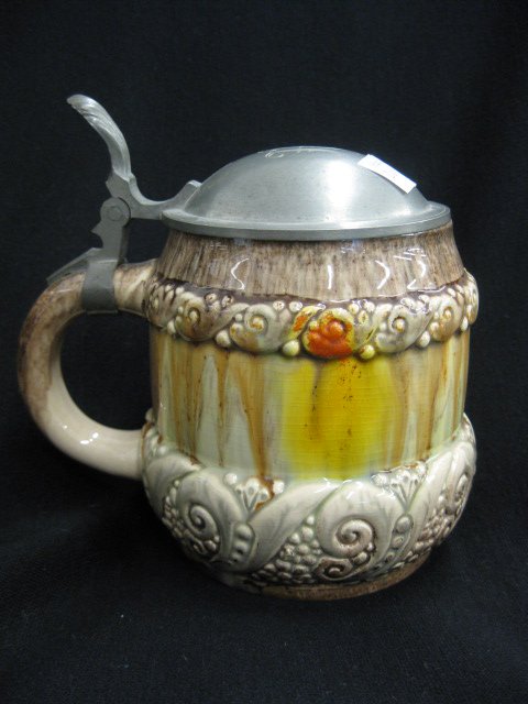 Majolica Pottery Stein,: 1/2 liter, pewter top, 5".
