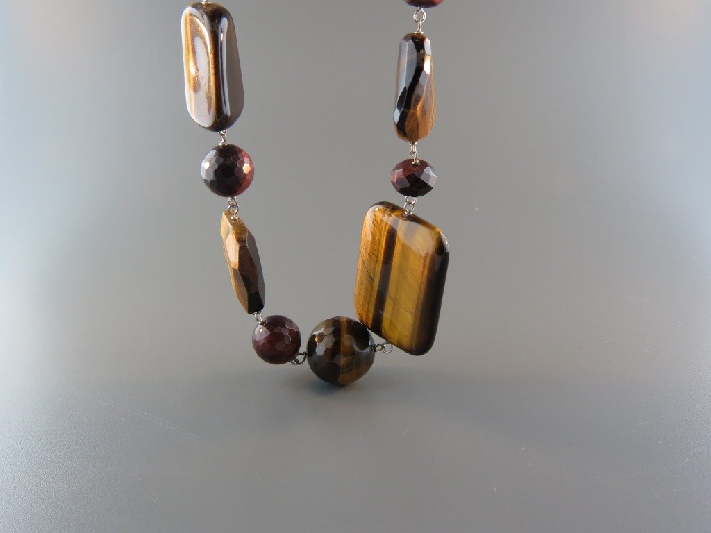 Sterling Silver Tigereye Necklace,: rich browns & reds with twisted rope links, up to 36" long.