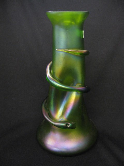 Loetz Art Glass Vase, "Snake" decor on green: iridescent twist body, 13" tall, drilled for lamp base...The Loetz (or Lötz) factory was founded by Johann Baptist Eisner in 1836 in the bohemian village of Klostermühle. In 1840 the company was tak