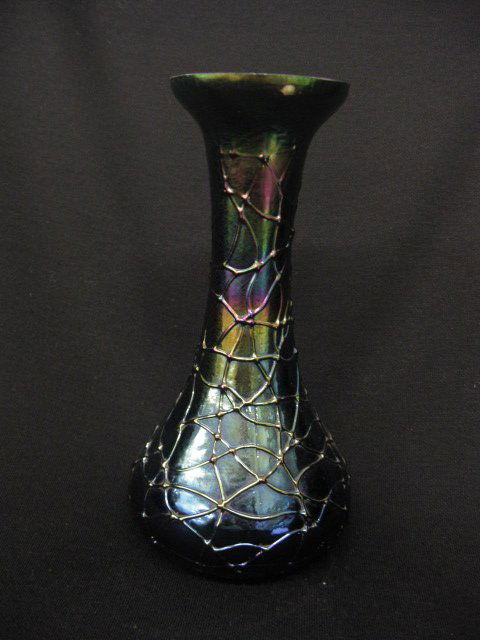 Loetz Art Glass Vase, applied trailing on: iridescent finish, black body, 8-1/4", excellent..The Loetz (or Lötz) factory was founded by Johann Baptist Eisner in 1836 in the bohemian village of Klostermühle. In 1840 the company was taken over