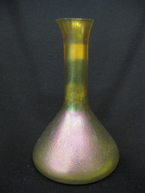 Loetz Art Glass Vase, overall oil spot iridescent: finish on yellow-green, 7-1/2", excellent...The Loetz (or Lötz) factory was founded by Johann Baptist Eisner in 1836 in the bohemian village of Klostermühle. In 1840 the company was taken over by Jo