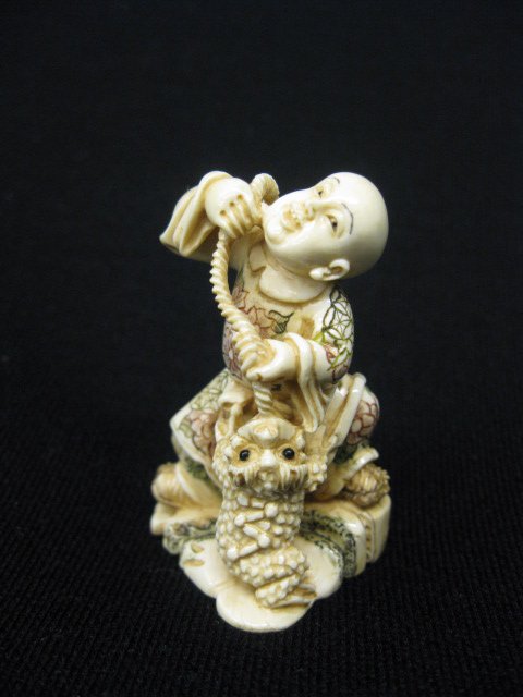 Carved Ivory Netsuke of Child & Toad,: fancy polychrome, signed, 2 1/8".