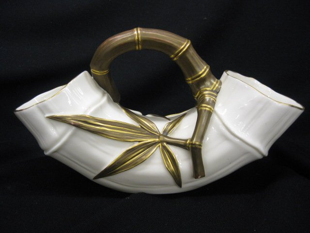 Royal Worcester Porcelain Figural Vase,: curved bamboo style cornucopia, 5-1/2" tall, 10" long, excellTHE BEGINNING In 1751 an event of historic significance occurred on the banks of the River Severn in Worcester, England. Here, under the br