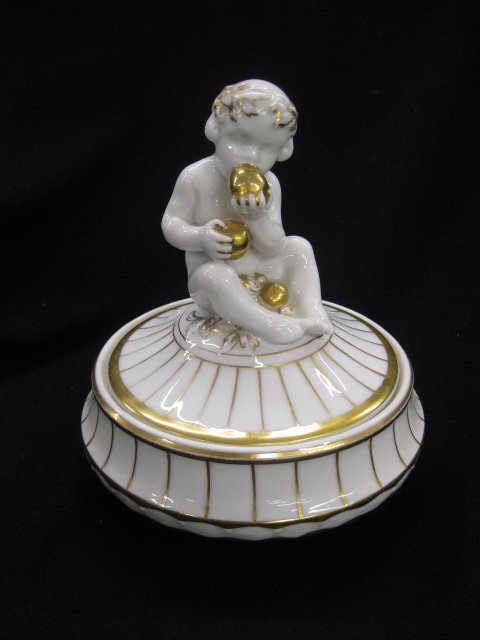 Hutschenreuther Lorenz Porcelain Box,: figural nude child eating fruit, deco era, 6-1/2", excellent..The company was founded in 1814 by Carolus Magnus Hutschenreuther (1794-1845) in Hohenberg an der Eger, Bavaria, Germany. He had previousl
