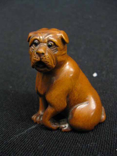 Carved Boxwood Netsuke of a Dog,: seated, 2", signed.