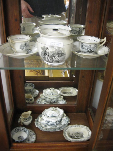 Early Children's Dishes, transferware ironstone,: includes platter, tureen, cups, saucers and more, mid 19th century.