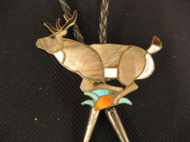 Indian Bolo Tie,: figural running deer with abalone, turquoise, coral & tortoise shell, 3" x 2", in sterling silver.