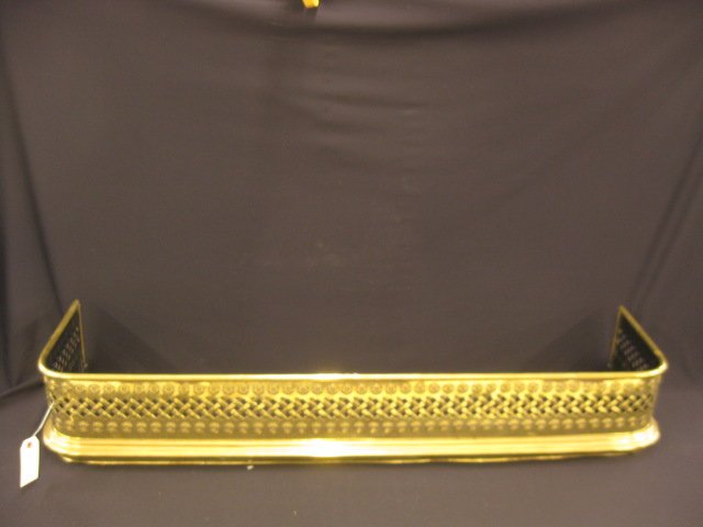 Brass Fireplace Fender,: bullseye and open latticework, 48" long, 8" tall, 12" deep.