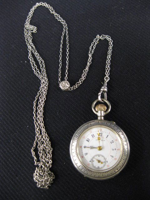 Sterling Silver Ladies Pendant Watch & Chain,: ornate case, 48" slide chain, circa 1890, working.