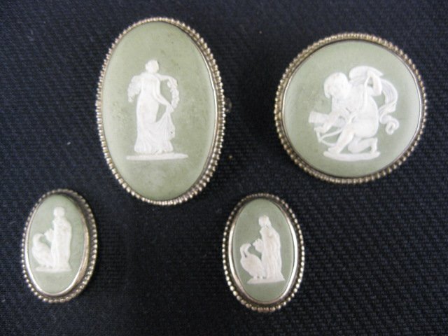 Wedgwood Green Jasperware Jewelry Lot,: round & oval brooches and pair of clip earrings, all sterling, all classical maiden or cherub designs.