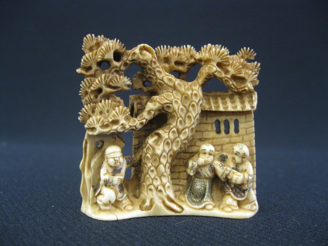 Carved Ivory Netsuke of Villagers,: fancy polychrome, signed, 1 7/8".