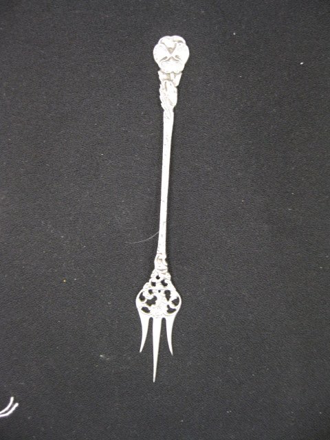 Dutch Silver Butter Pick,: floral triple tine, fancy openwork, 7", hallmarked, 22 grams.