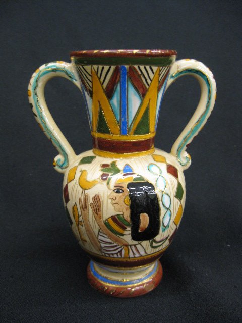 Deruta Italian Faience Pottery vase,: Egyptian motif, 6", excellent. Deruta Ceramics are a type of enamelled ceramics produced in the Italian town of Deruta. [edit]Overview Deruta ceramics are a typical product of Deruta, a picturesque me