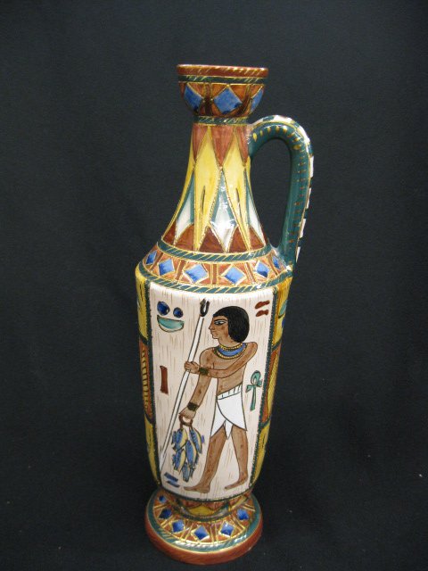 Deruta Italian Faience Pottery Vase,: Egyptian motif, bottle form, 12 1/2", excellent. Deruta Ceramics are a type of enamelled ceramics produced in the Italian town of Deruta. [edit]Overview Deruta ceramics are a typical product of Deruta