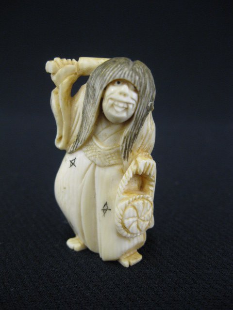 Carved Ivory Netsuke of a Woman,: happy & sad revolving face, 2", signed.
