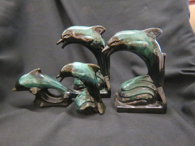 4 Blue Mountain Pottery Figurines of Dolphins,: 5" to 9", excellent.....Blue Mountain Pottery was a Canadian pottery company located in Collingwood, Ontario. It was founded in 1947 by Jozo Wieder and closed in 2004.[1] Originally producing hand pai
