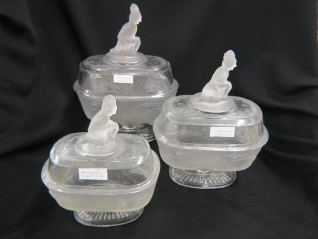 Set of 3 "Westward Ho" Pattern Glass Compotes,: graduated sizes, oval, 9" to 11 1/2", excellent, Indian finials...A clear pressed glass with frosted relief designs comprising a pioneer’s log cabin with charging buffalo and fleeing deer in scenes 