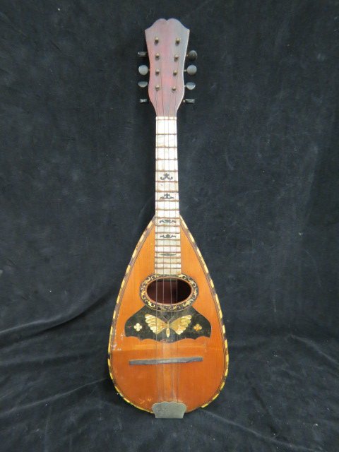 Charles A. Stromberg Mandolin,: fancy mother-of-pearl inlay, famous Boston maker, 23" long...Stromberg Guitars was an American company producing guitars, mainly for jazz musicians, between 1906 and 1955. They produced only around 64