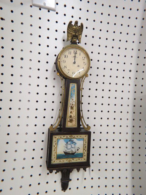 Waltham Banjo Wall Clock,: brass eagle finial, reverse painting with ship, 20" tall, currently working.