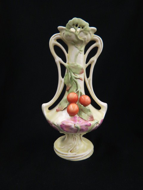 Teplitz Amphora Pottery Vase,: berry & floral on ivory, openwork top, fancy handles, 12" tall...Between 1892 and 1918 the Amphora Pottery Company manufactured thousands of remarkably imaginative and delicately crafted ceramic vesse