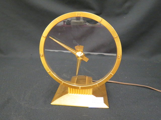 Jefferson "Golden Hour" Electric Clock,: 7 1/2" dial, brass finish, currently working...famous Jefferson Golden Hour Clock. This is the electric-powered, gold-rimmed, "see through" mystery clock made by the Jefferson Electric Company from th