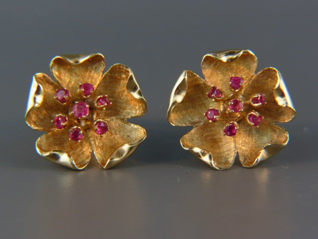 Ruby Earrings,: each has 7 rubies, over 1 carat total, 14k yellow gold floral settings, 1" diameter, clip style, 13.3 grams.